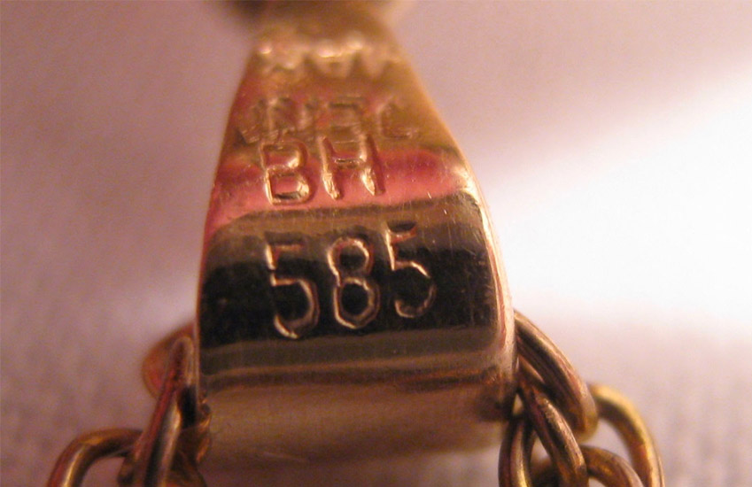 Золото 585 пробы: особенности и актуальные цены скупки